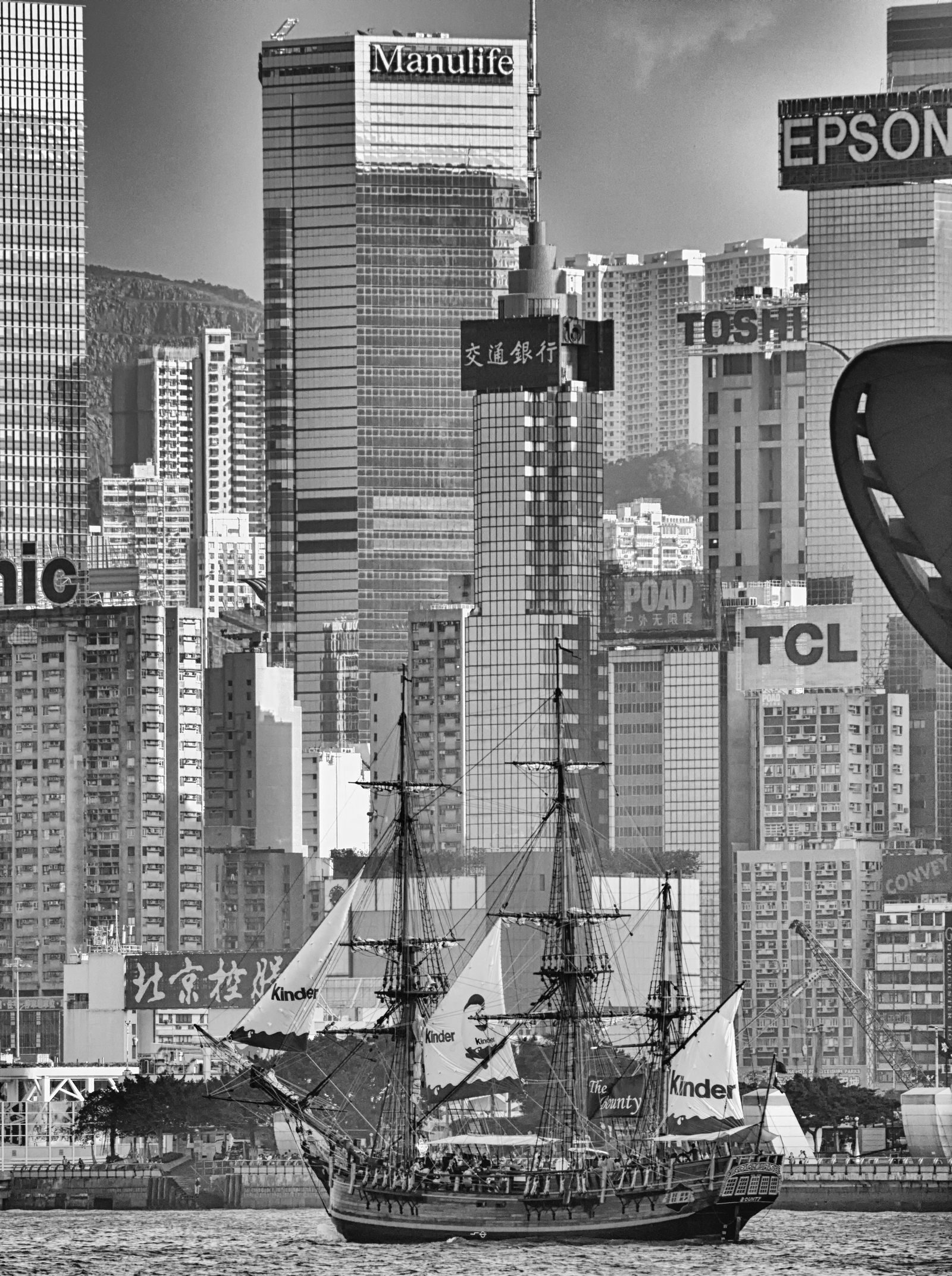 Timeless Vessel Amid Urban Giants